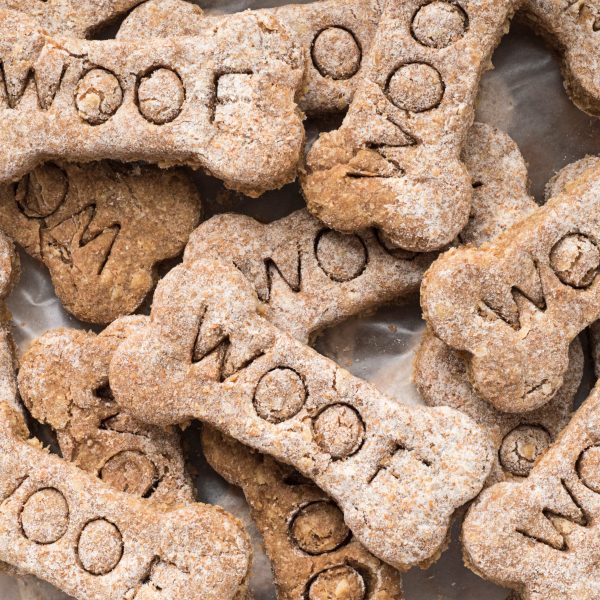 pile of dog treats with the word woof on them