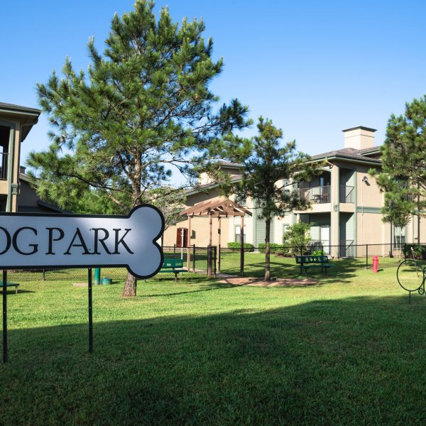 community on-site dog park with dog park sign